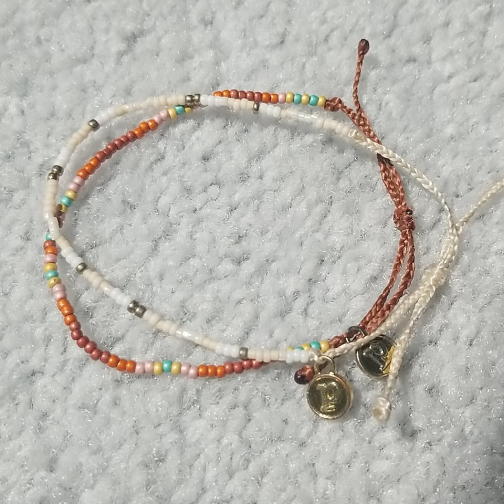 Two Pura Vida Seed Bead Bracelets